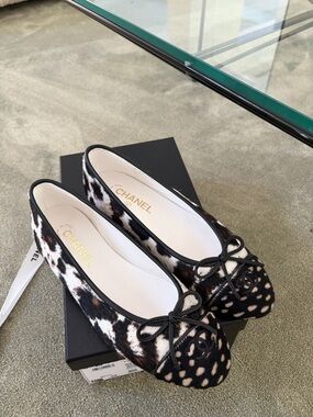 CHANEL Black White and Brown Calf Hair Ballet Flats with Bow Accent